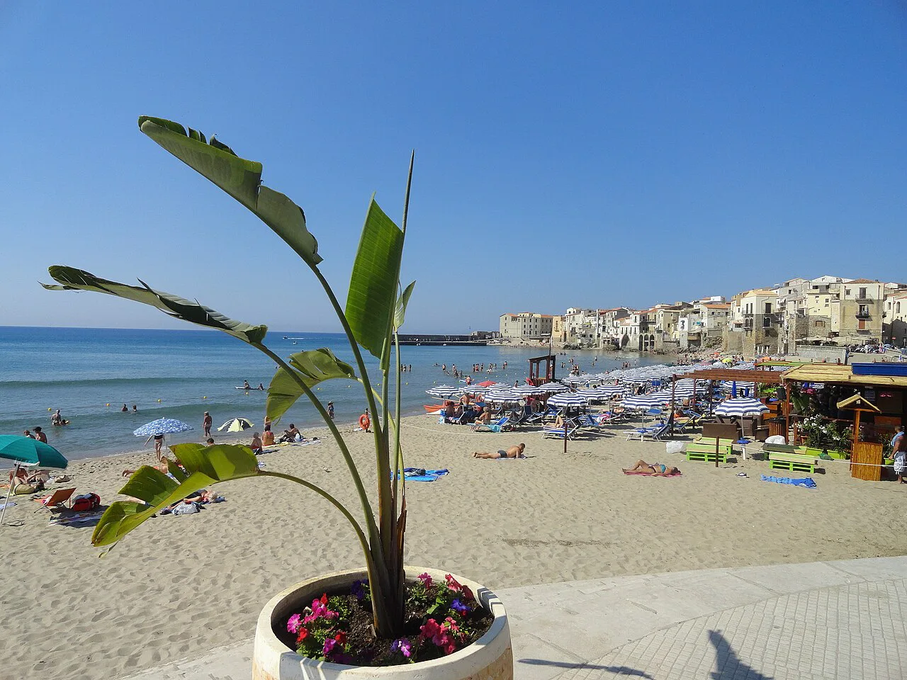 Beach and old houses in Cefalù.