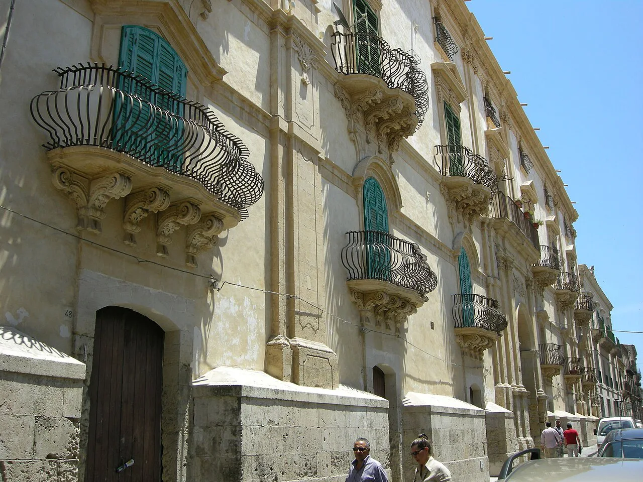 Balconies on a street in Noto.