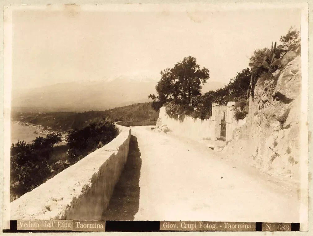 Mount Etna seen from Taormina, photographed by Giovanni Crupi (1861–1925).