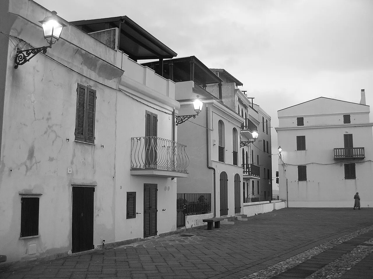 An old-town square in Alghero.