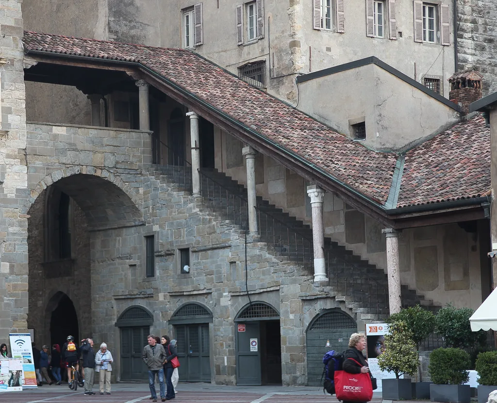 Arcaded staircase off Piazza Vecchia in Bergamo.