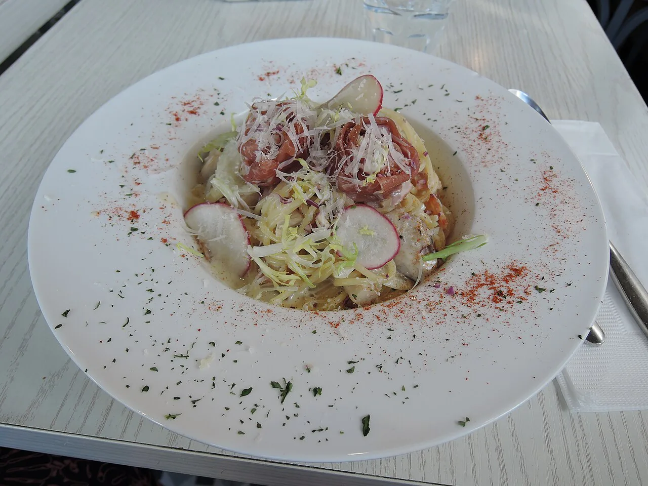 Pasta with cream sauce and ham in Parma.