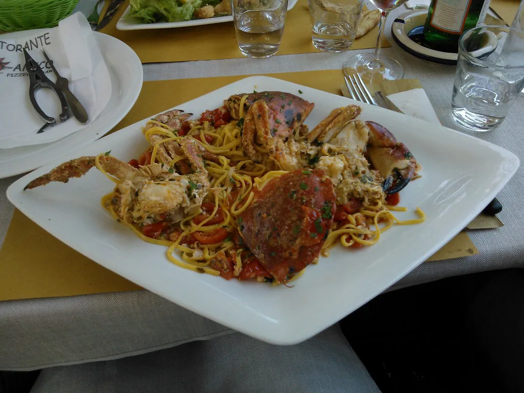 Seafood pasta on a plate in Rimini.