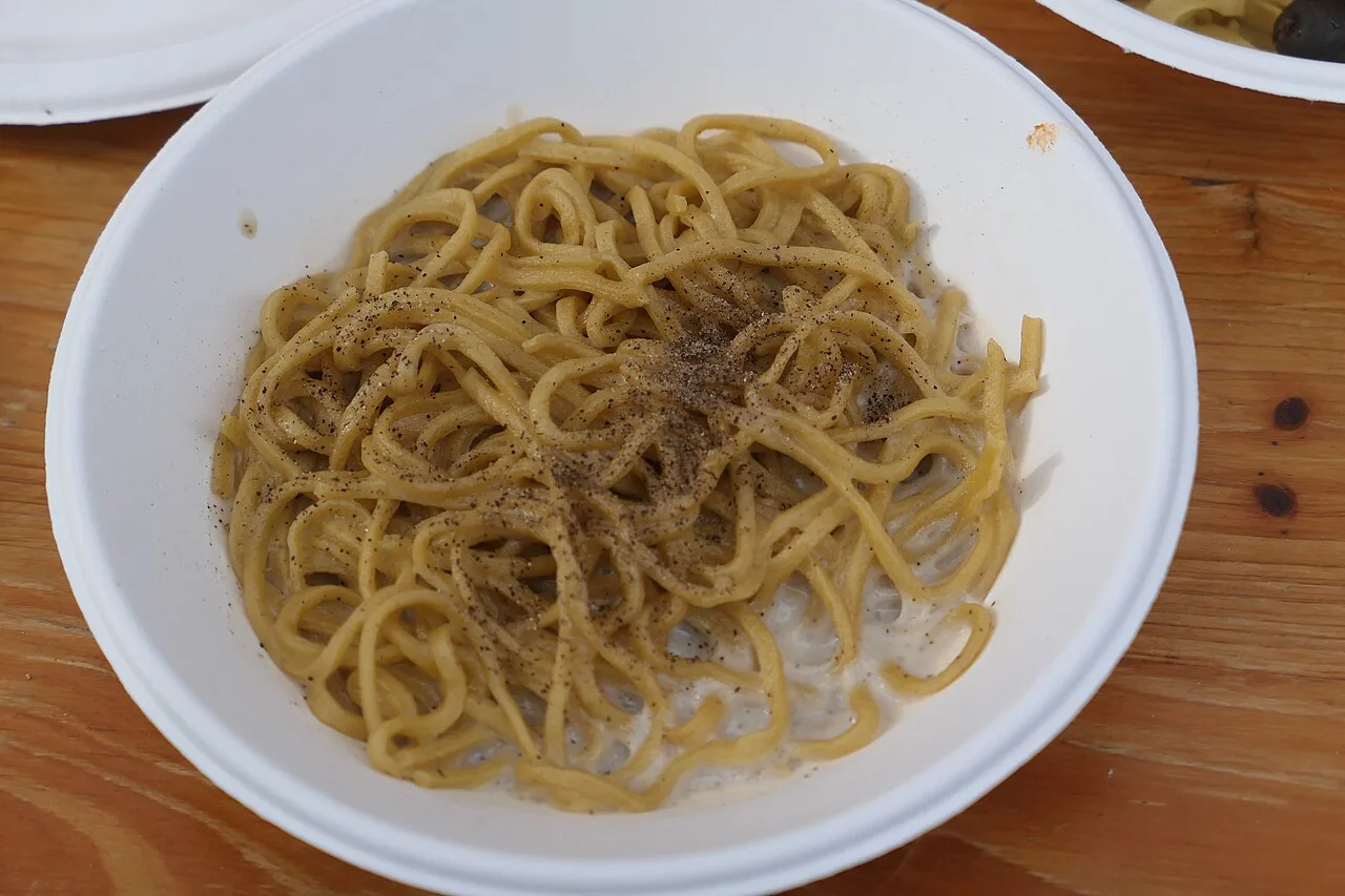 A bowl of fresh pasta with truffle.