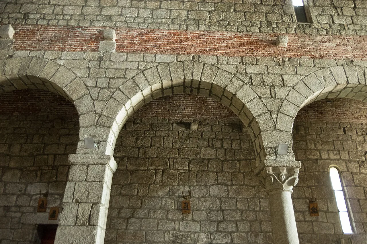 Granite arches inside San Simplicio in Olbia.
