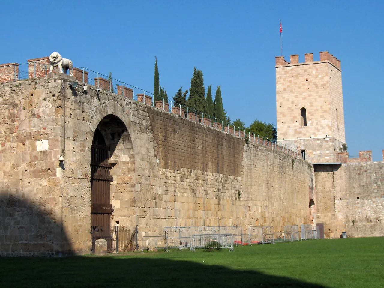 Pisa's medieval city walls by the Campo dei Miracoli.