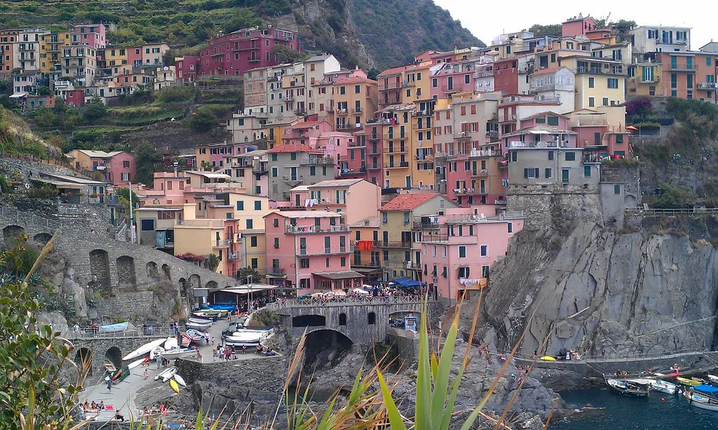 Manarola's pastel houses seen from above the harbour.