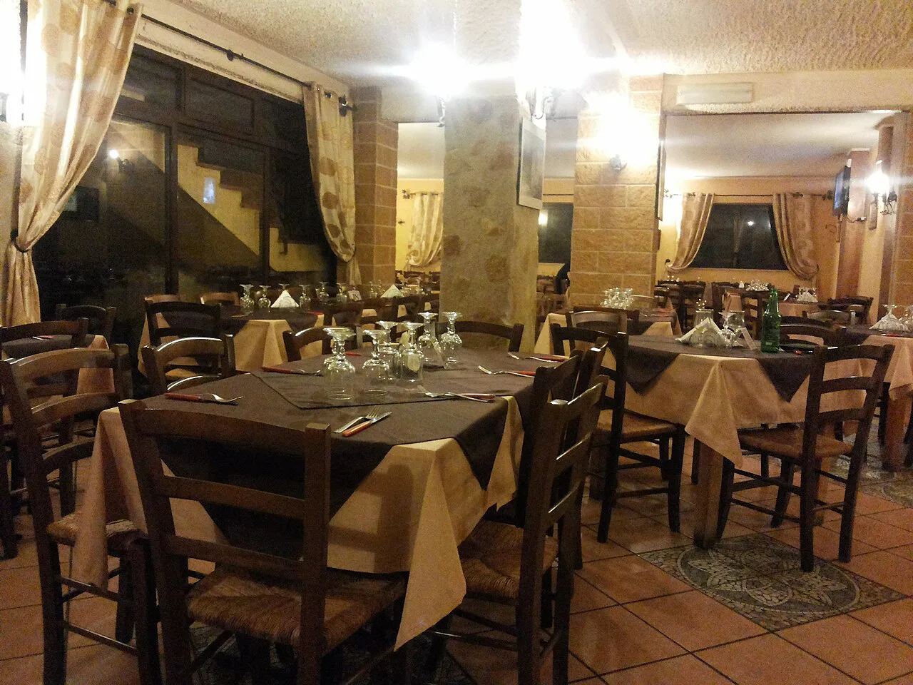 A traditional pizzeria dining room.