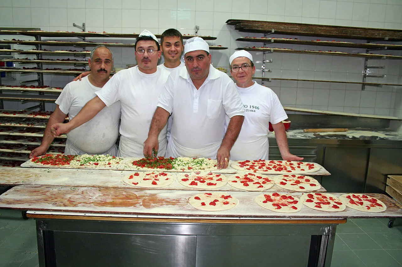 Pizza makers at Pizzeria Calvino in Trapani.
