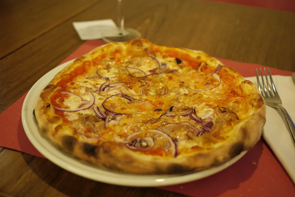 Tuna and onion pizza in a Verona pizzeria.