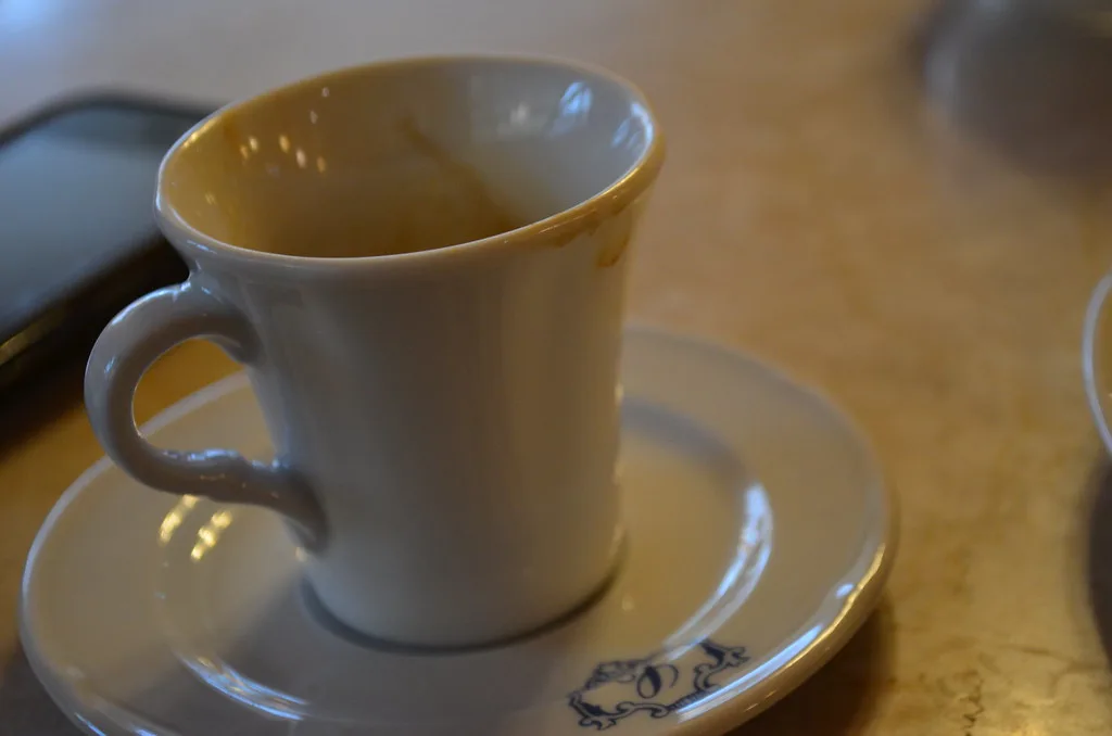 Coffee cup on a saucer in Cortina d'Ampezzo.