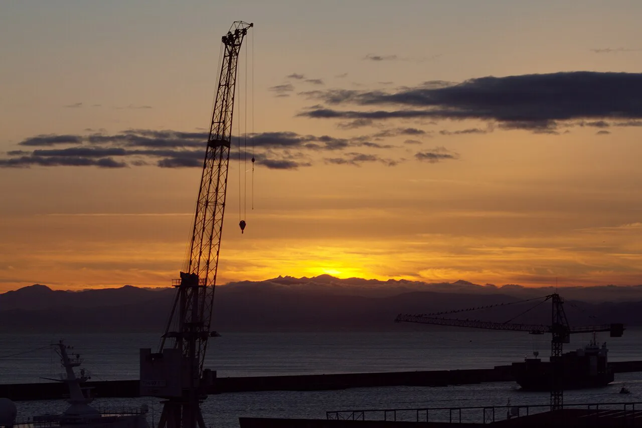 Sunset over Genoa harbour.