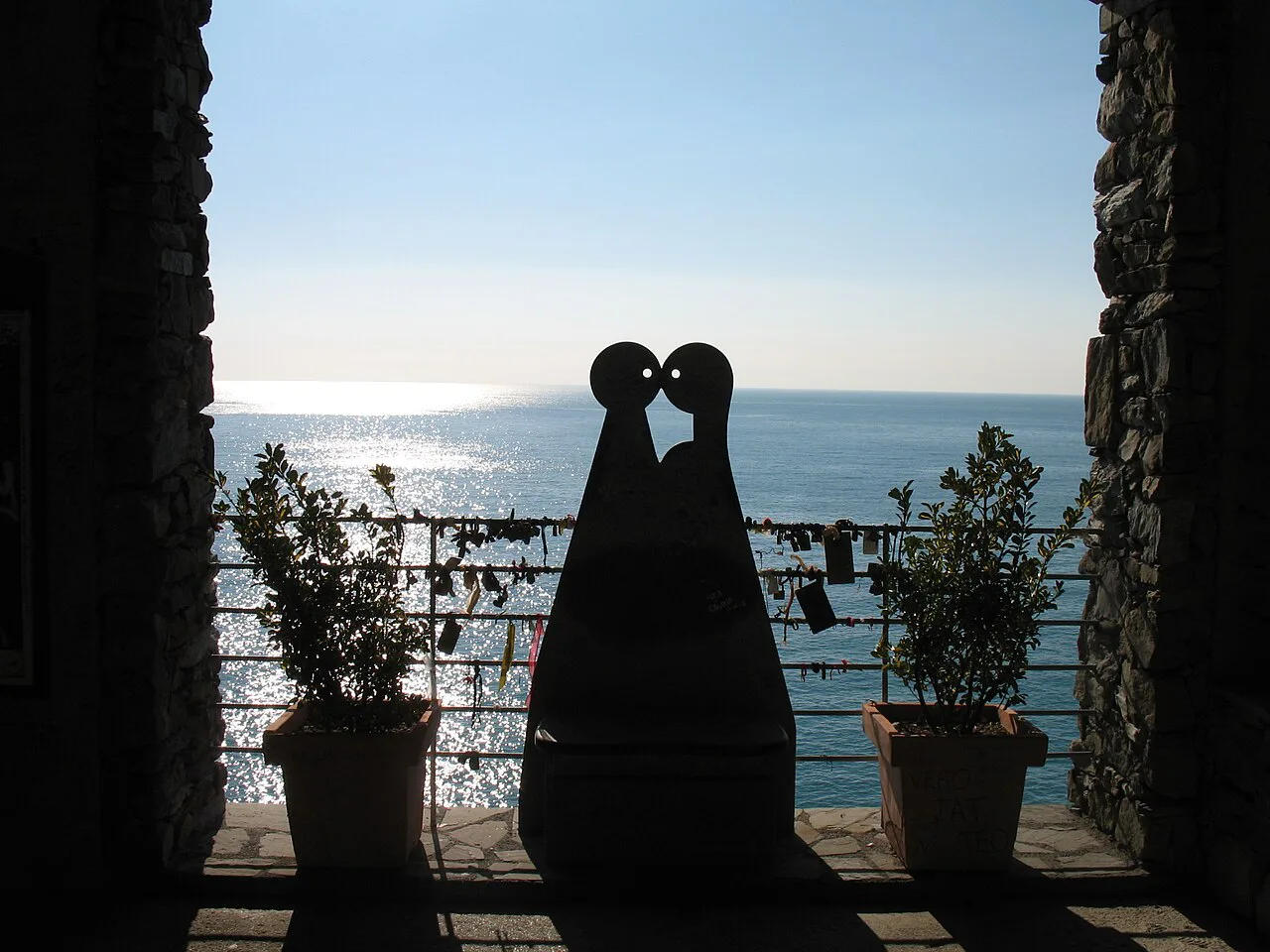 Sea view framed by a stone window at Manarola.