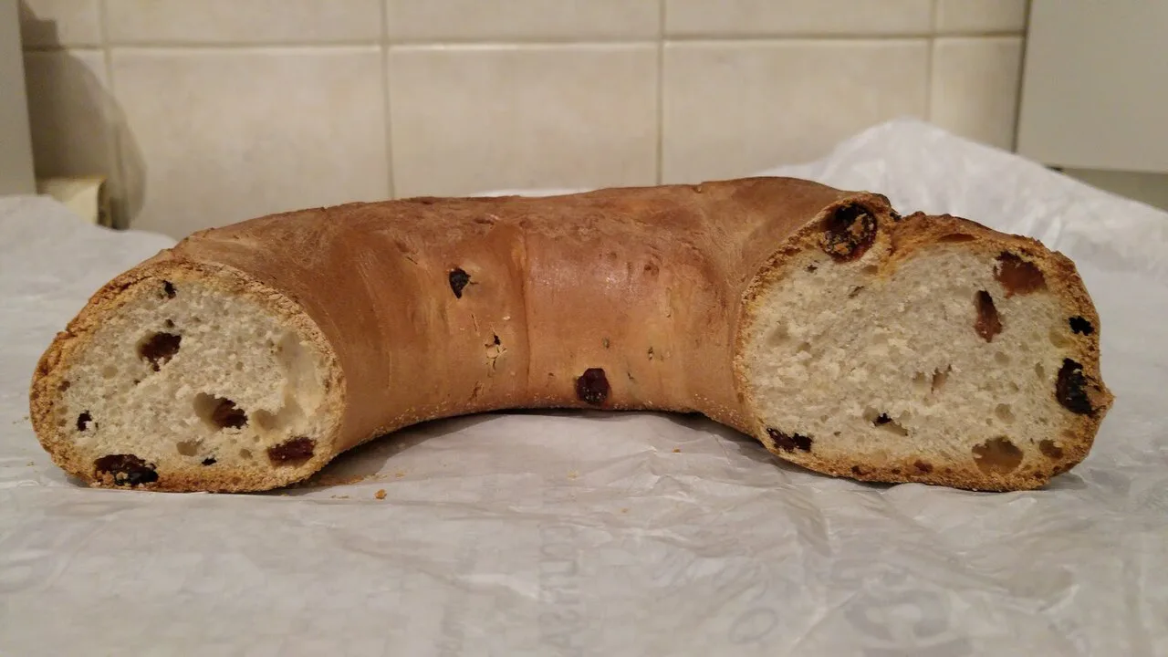 A ring of buccellato di Lucca, cut open.