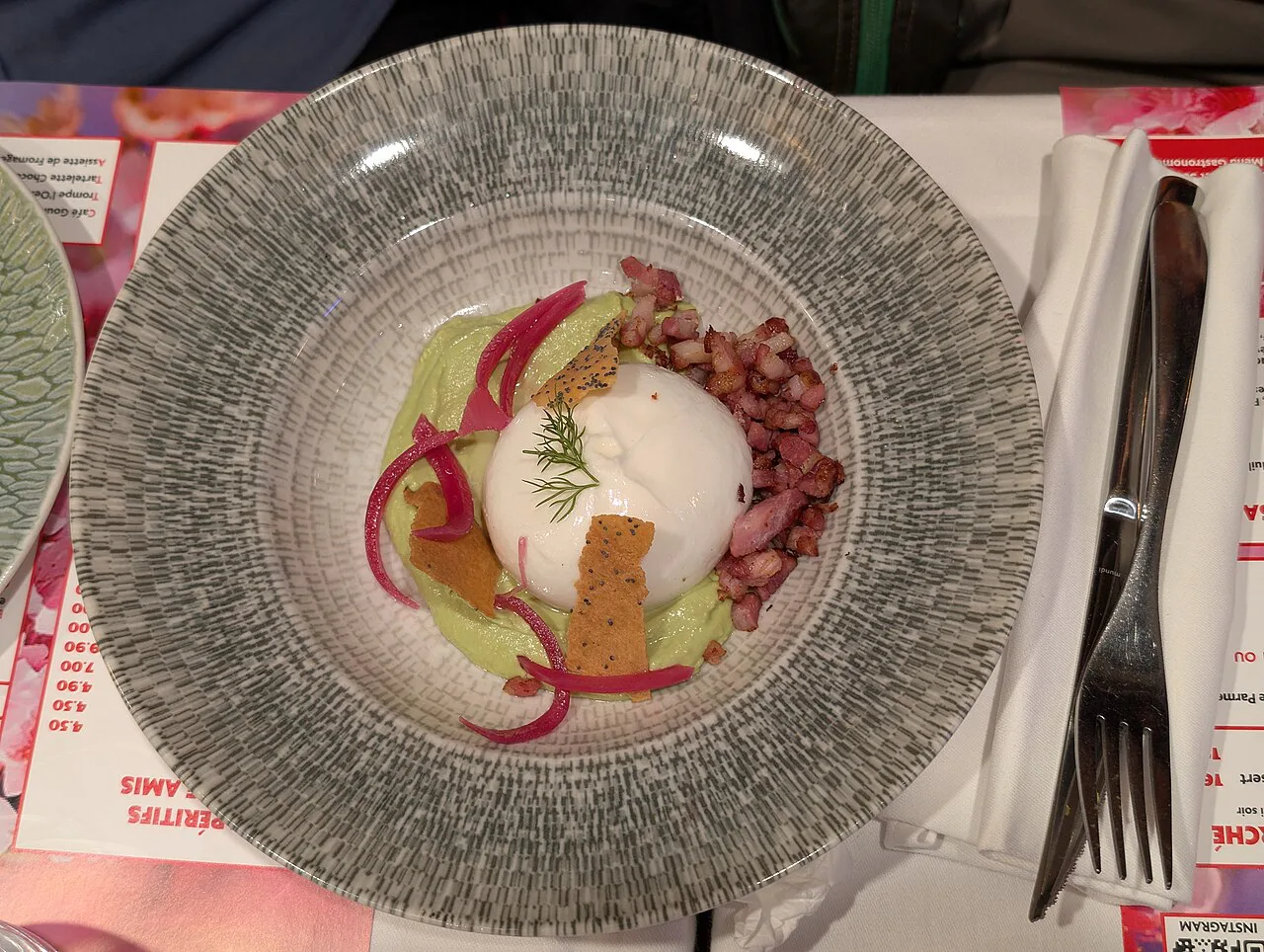 Plated burrata starter.