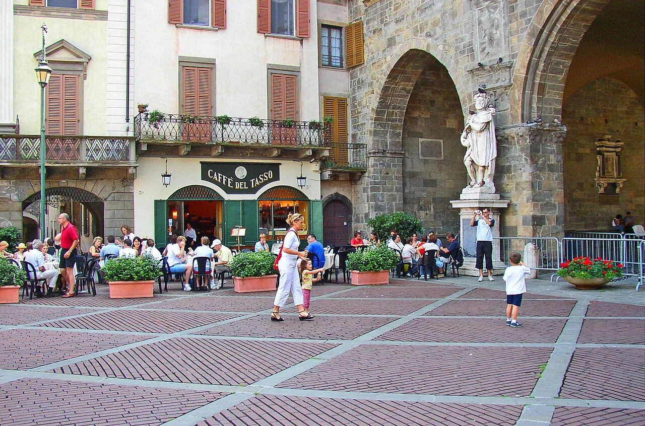 Piazza Vecchia in Bergamo with a cafe.