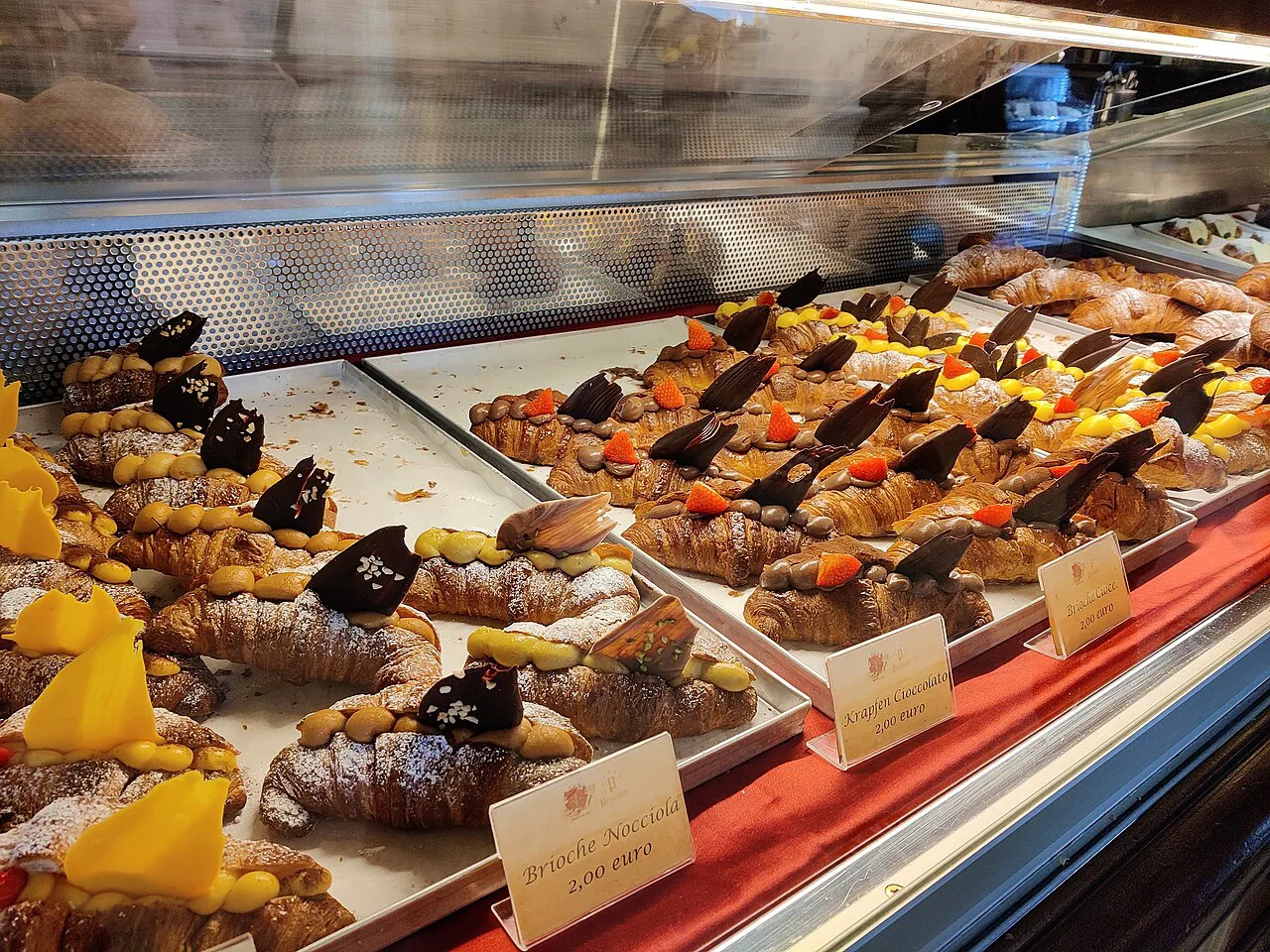 Pastries in a display case at Caffè degli Specchi in Trieste.