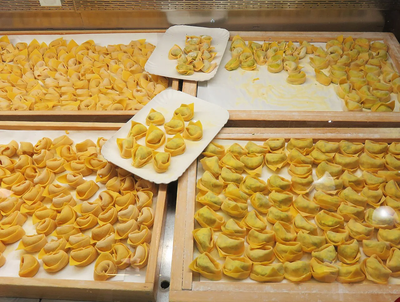 Trays of fresh filled pasta.