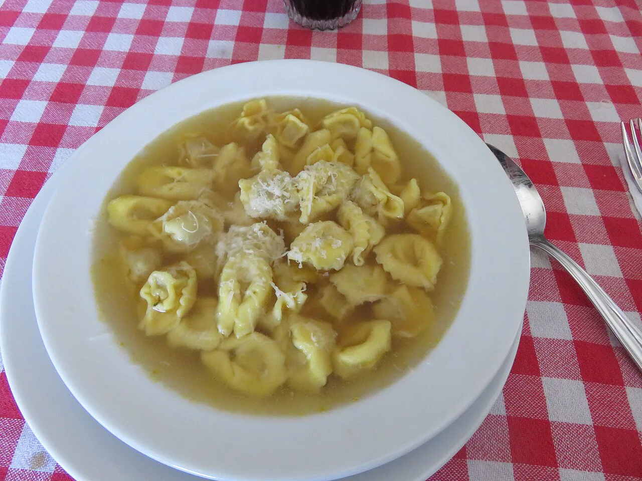 Cappelletti in broth with Parmigiano Reggiano.