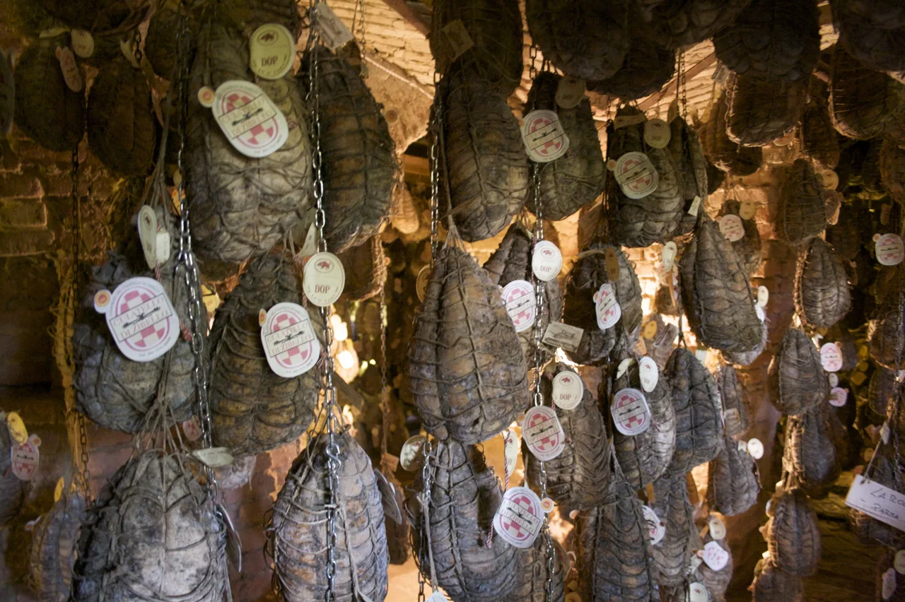 Culatelli ageing in a cellar.