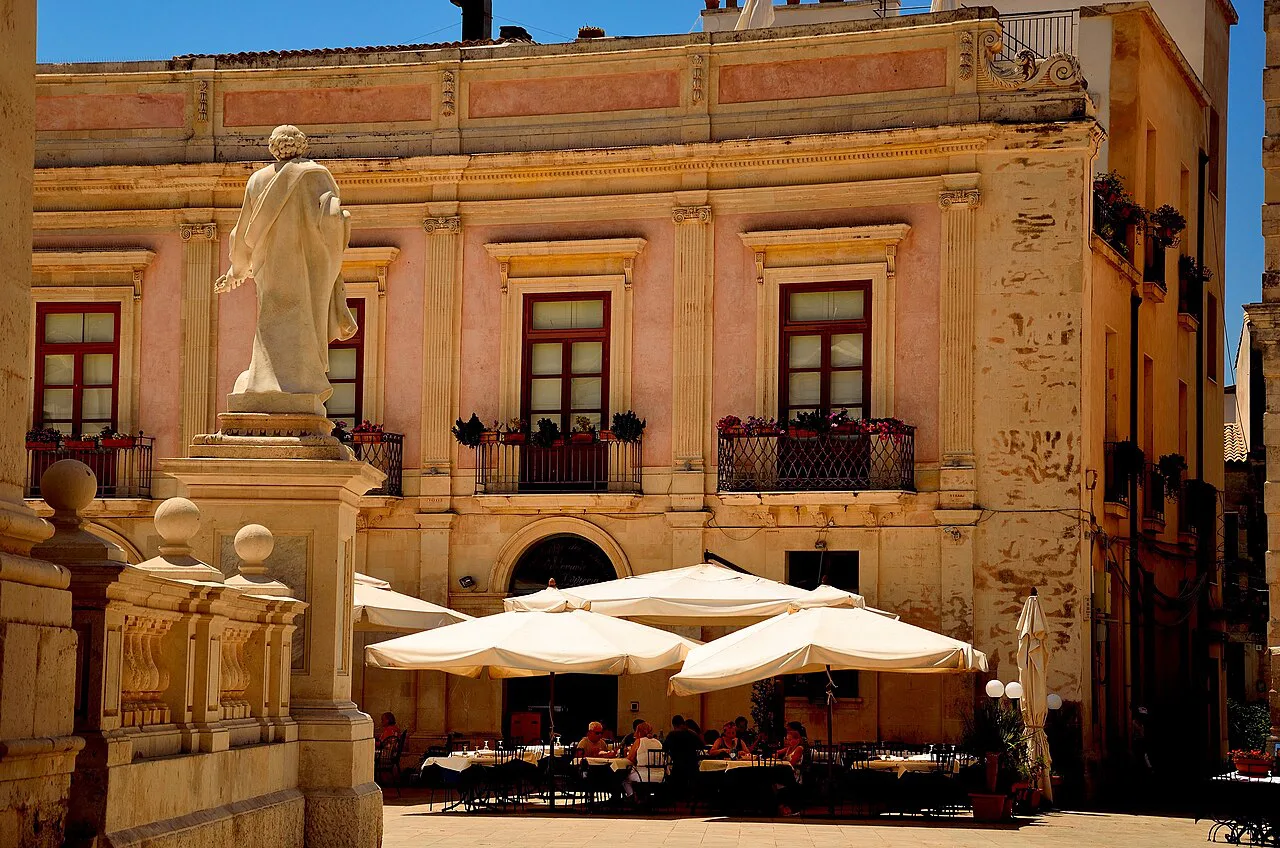 Café terraces in a Syracuse piazza.