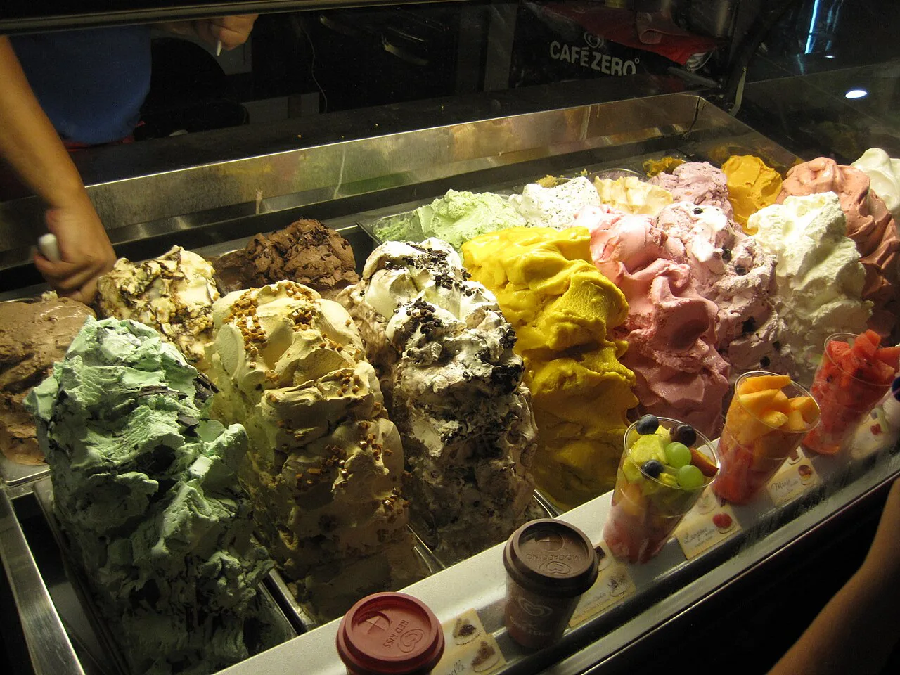 Display of colourful gelato flavours in a gelateria.