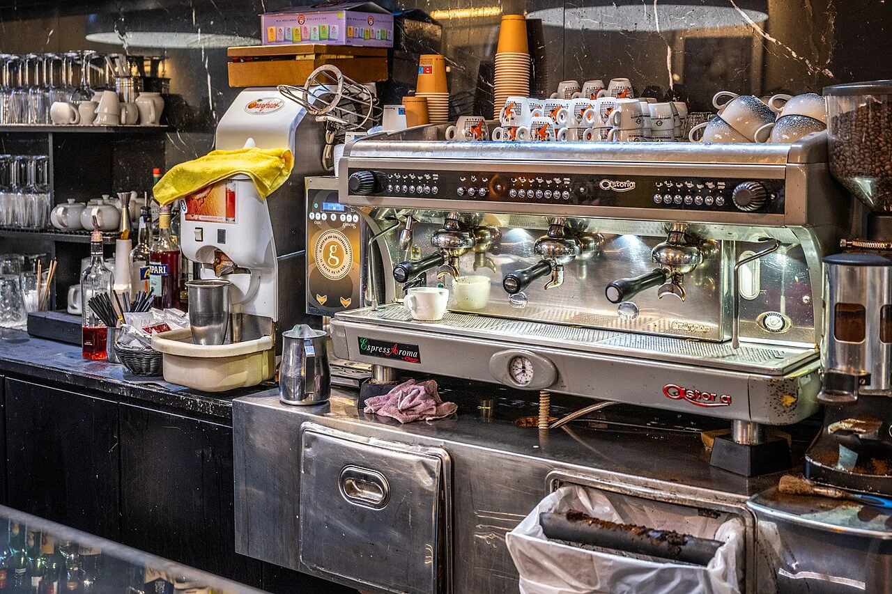 Espresso machine and counter of a coffee bar in Rome.