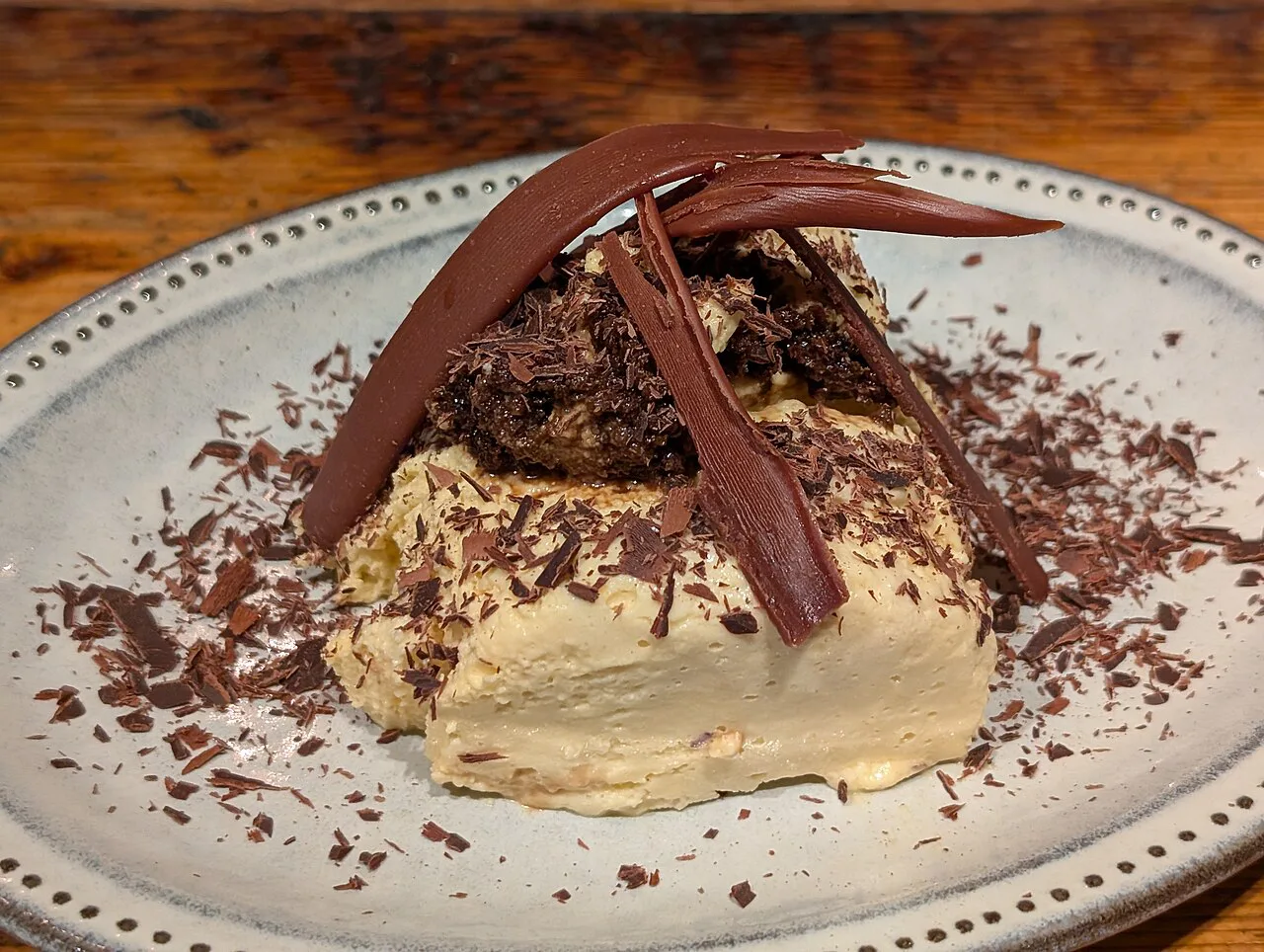 Tiramisu dusted with chocolate.