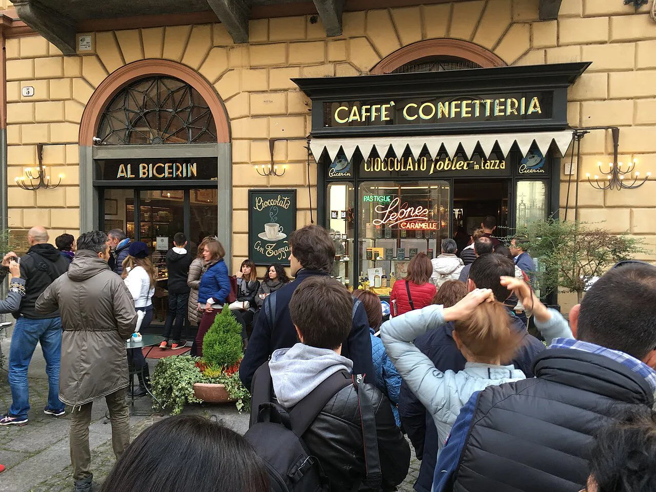 Cafe with a queue outside in Turin.