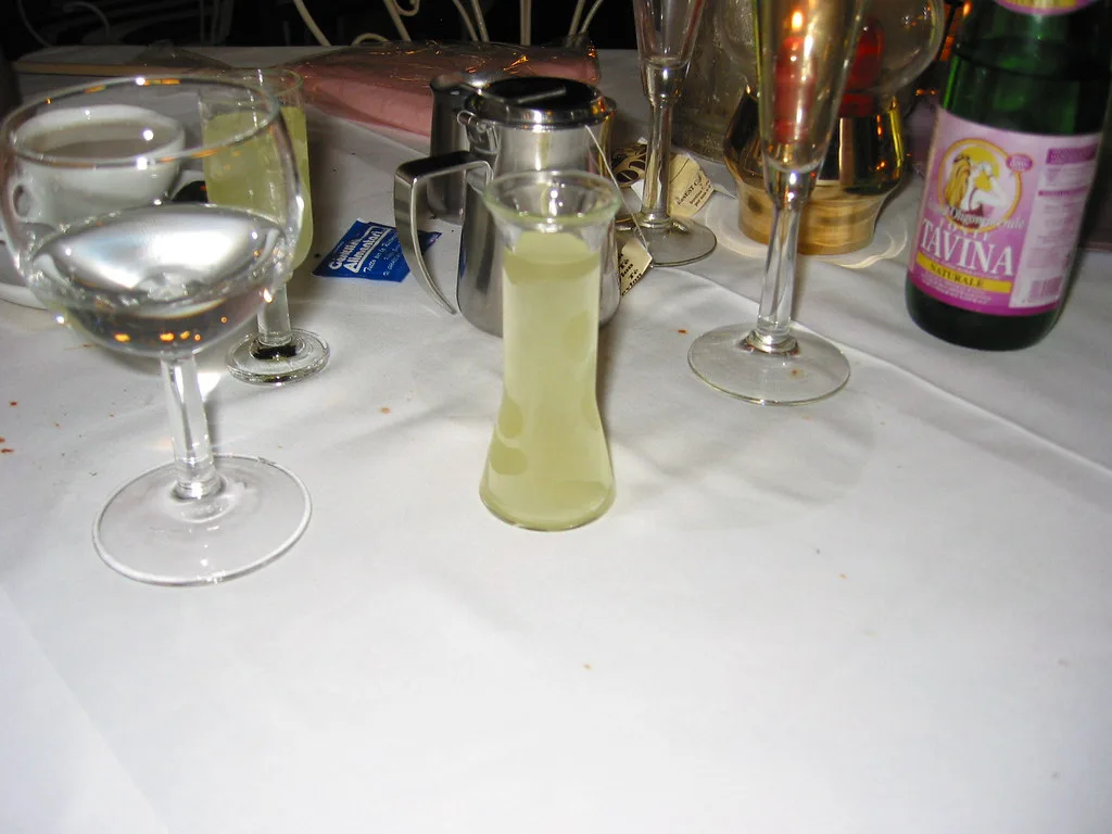 Lemon liqueur served with glasses in Limone sul Garda.