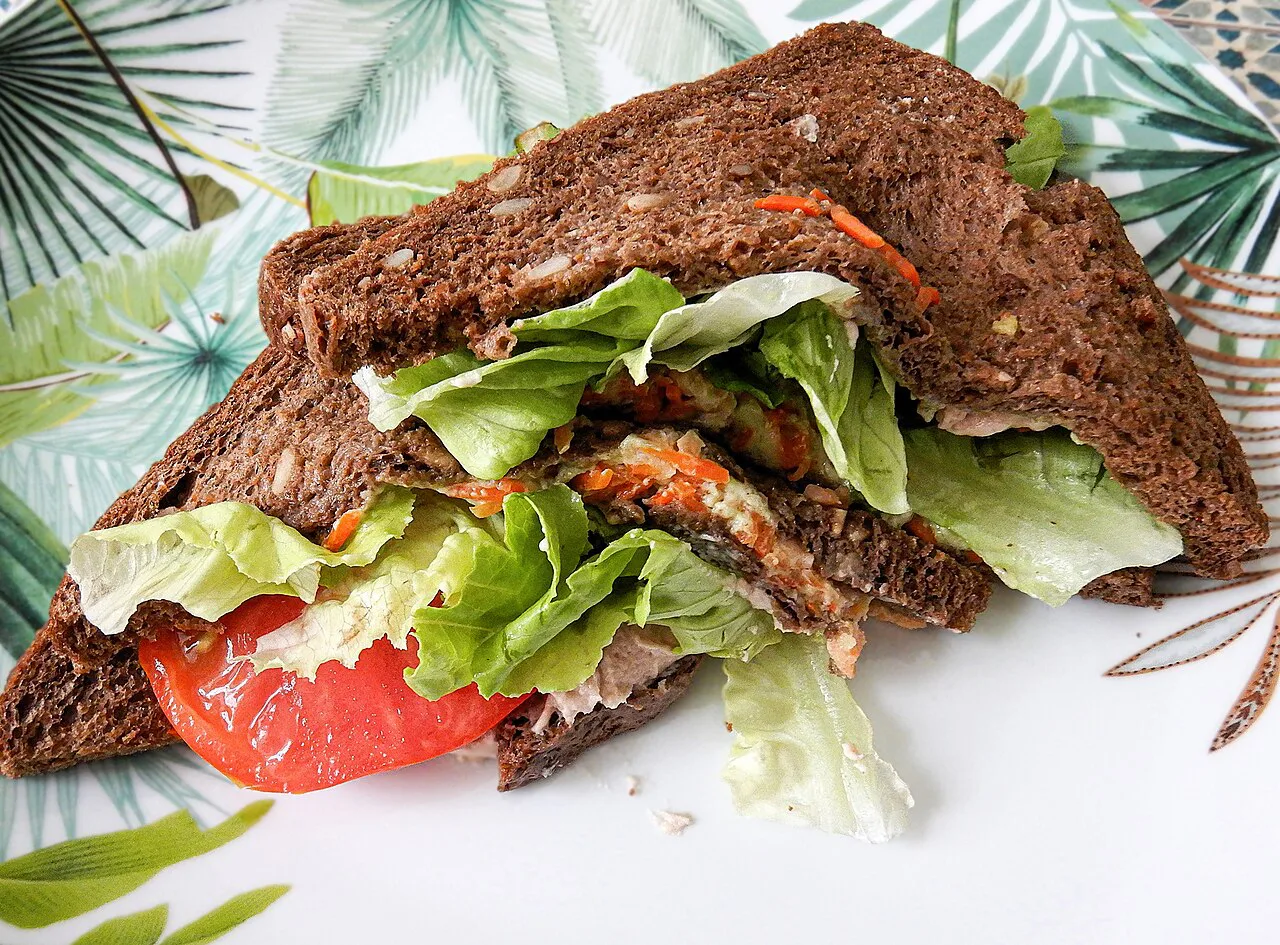 A wholemeal tramezzino with salad.
