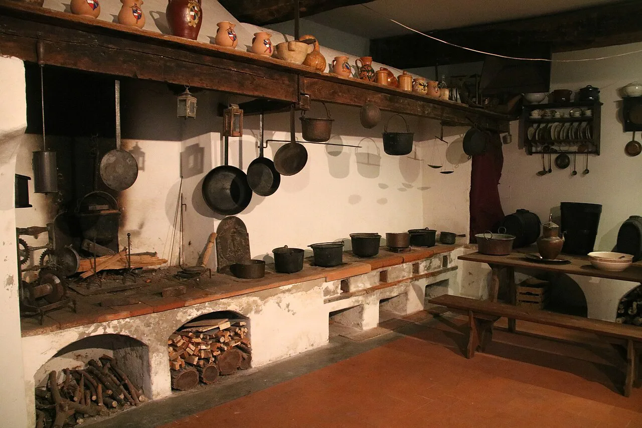 Old kitchen with copper pots in Bagni di Lucca.