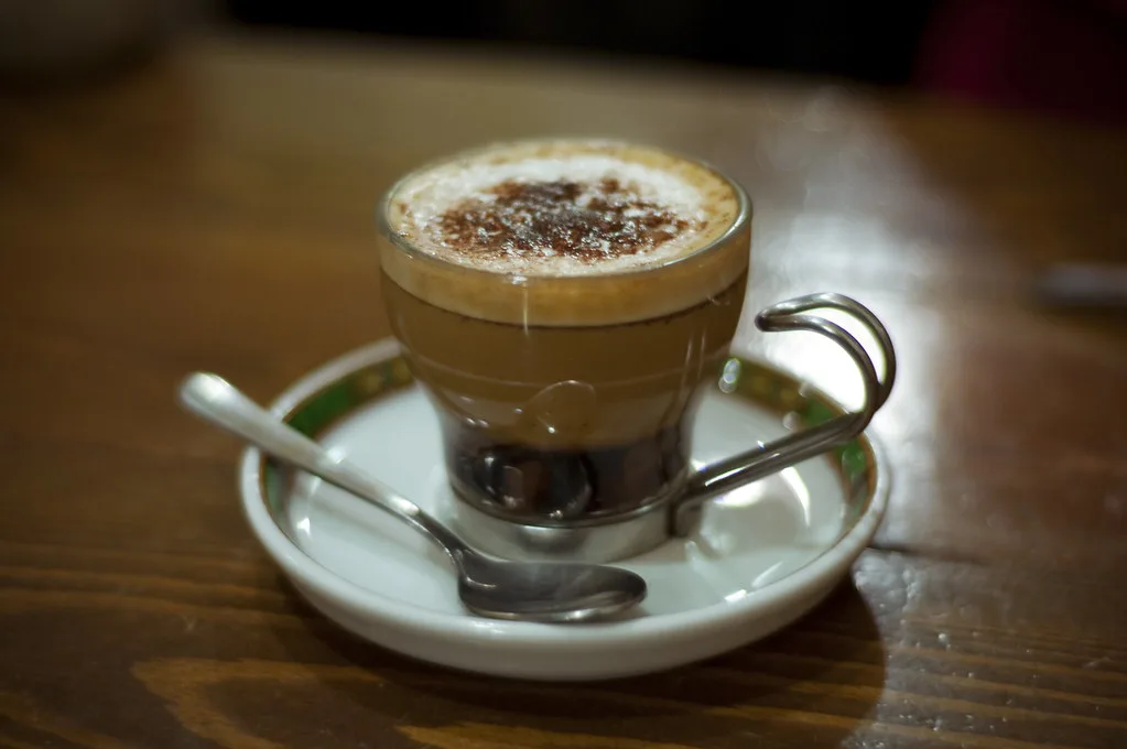 Marocchino coffee in a glass cup.