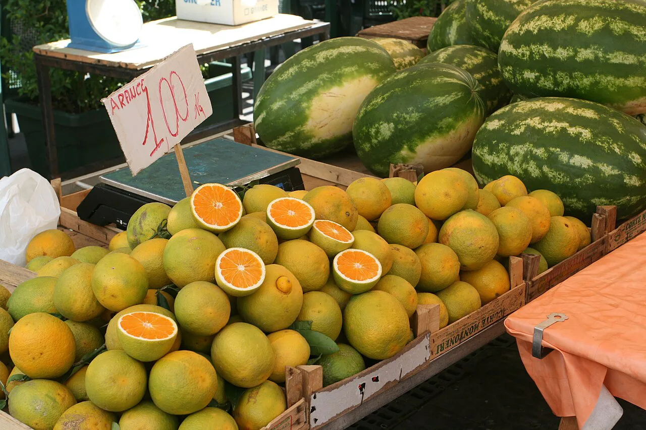 Oranges and watermelons at a market stall in Syracuse.
