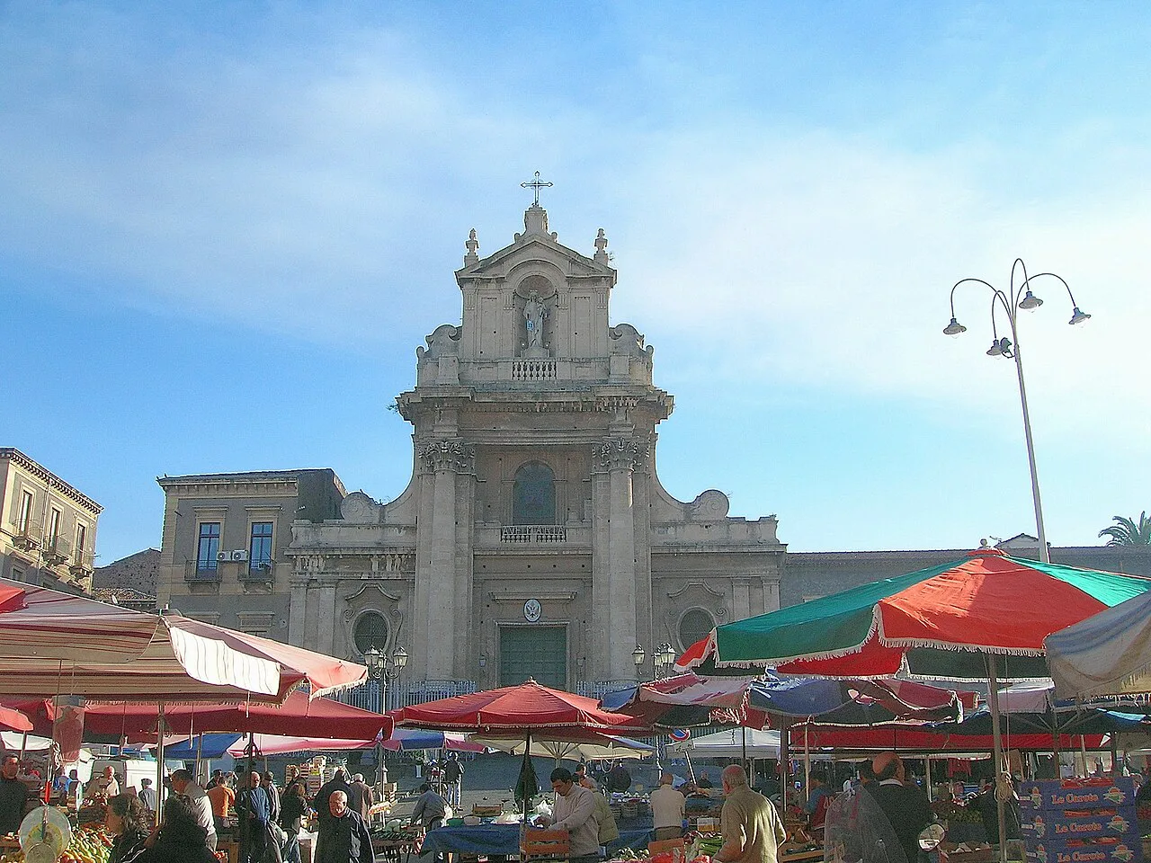 Market stalls in front of the church in Catania.