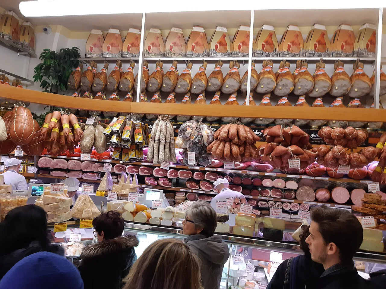 Hams and sausages in a Bologna delicatessen.