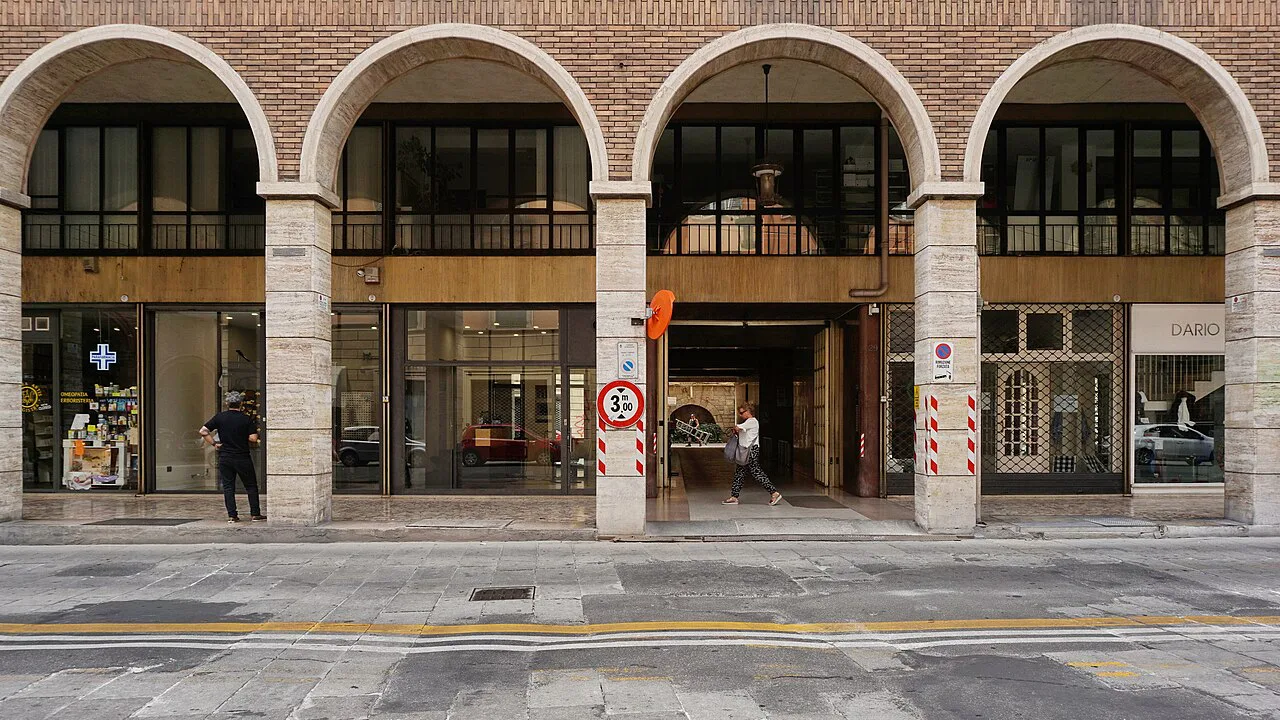 Portico with shops in Bologna.