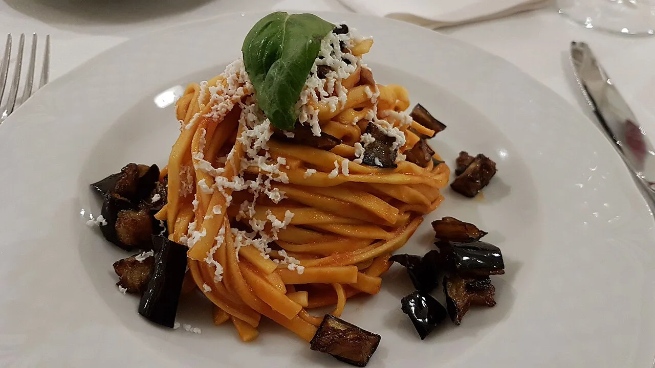 Pasta alla Norma with spaghetti and ricotta salata.