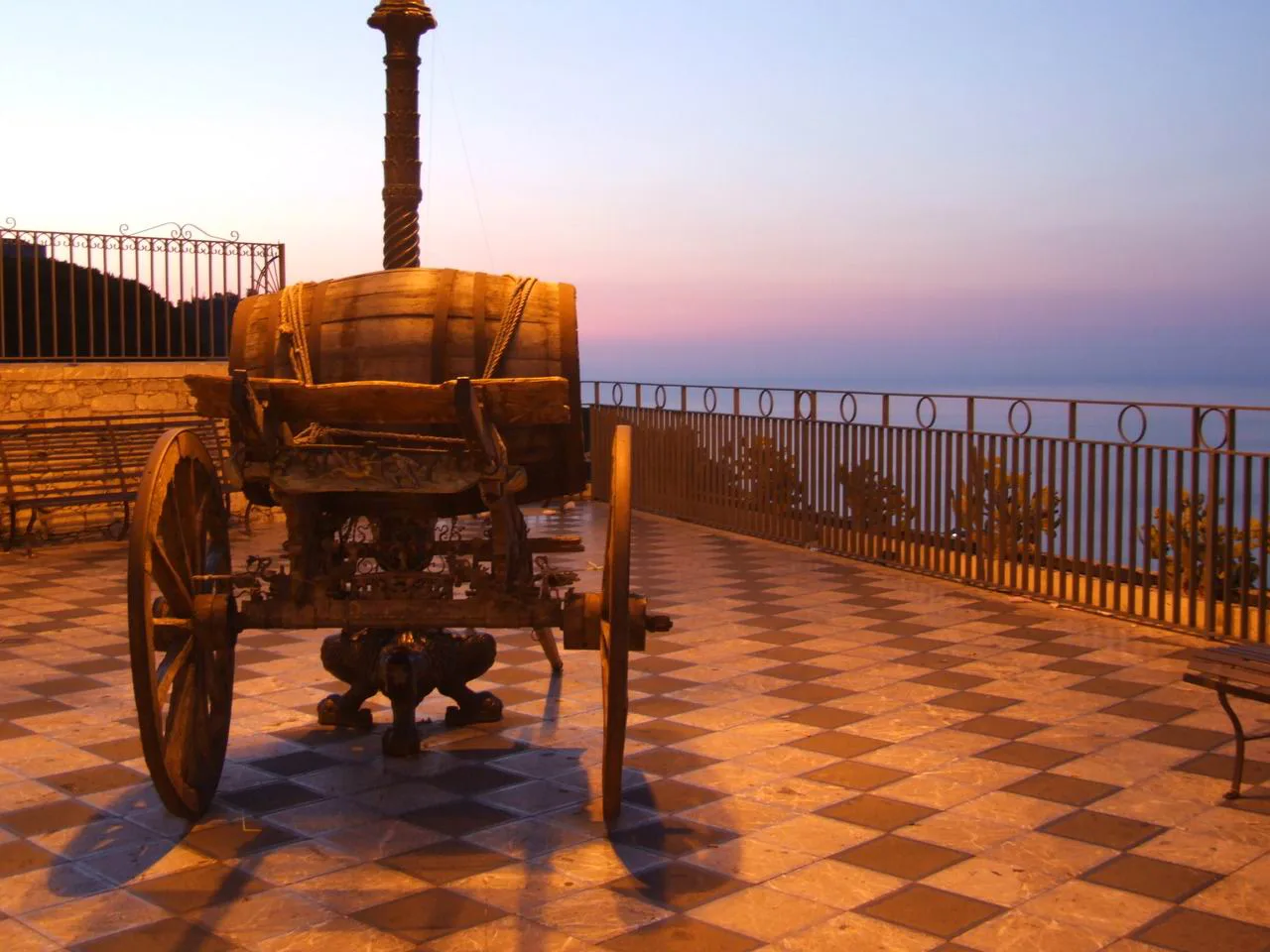 A traditional Sicilian cart on the terrace of Piazza IX Aprile in Taormina.