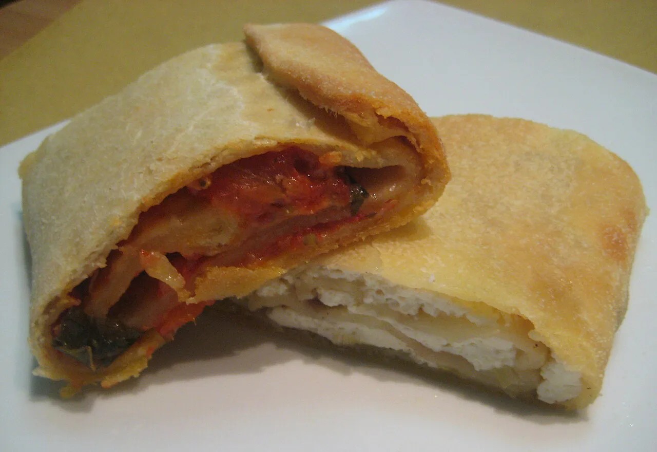 Scaccia filled with tomato sauce and ricotta.