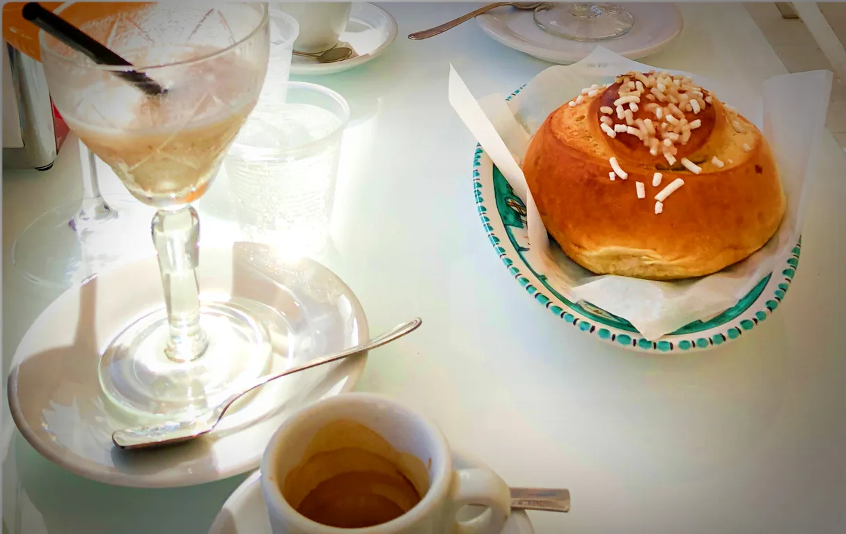 Almond granita with a brioche and a coffee.