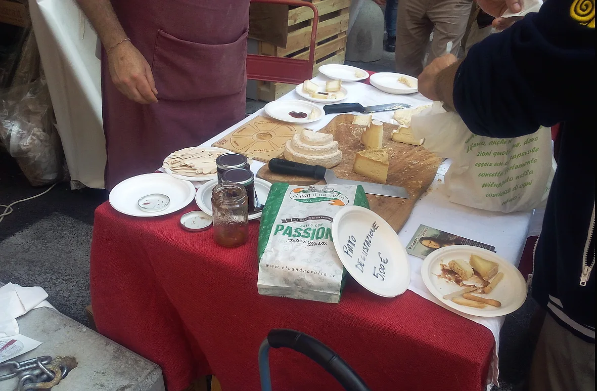 A cheese tasting stand at Salone del Gusto.
