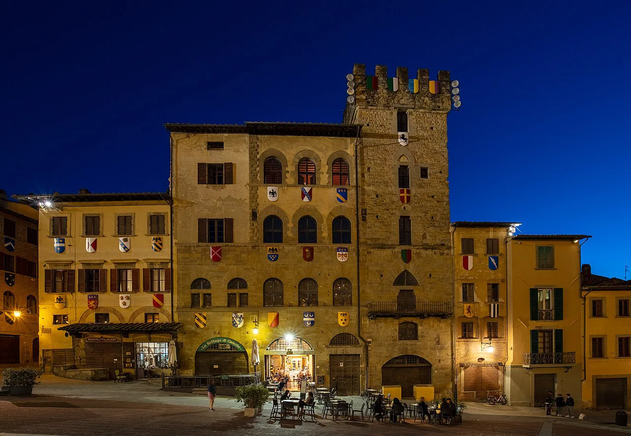 Piazza Grande in Arezzo at dusk.