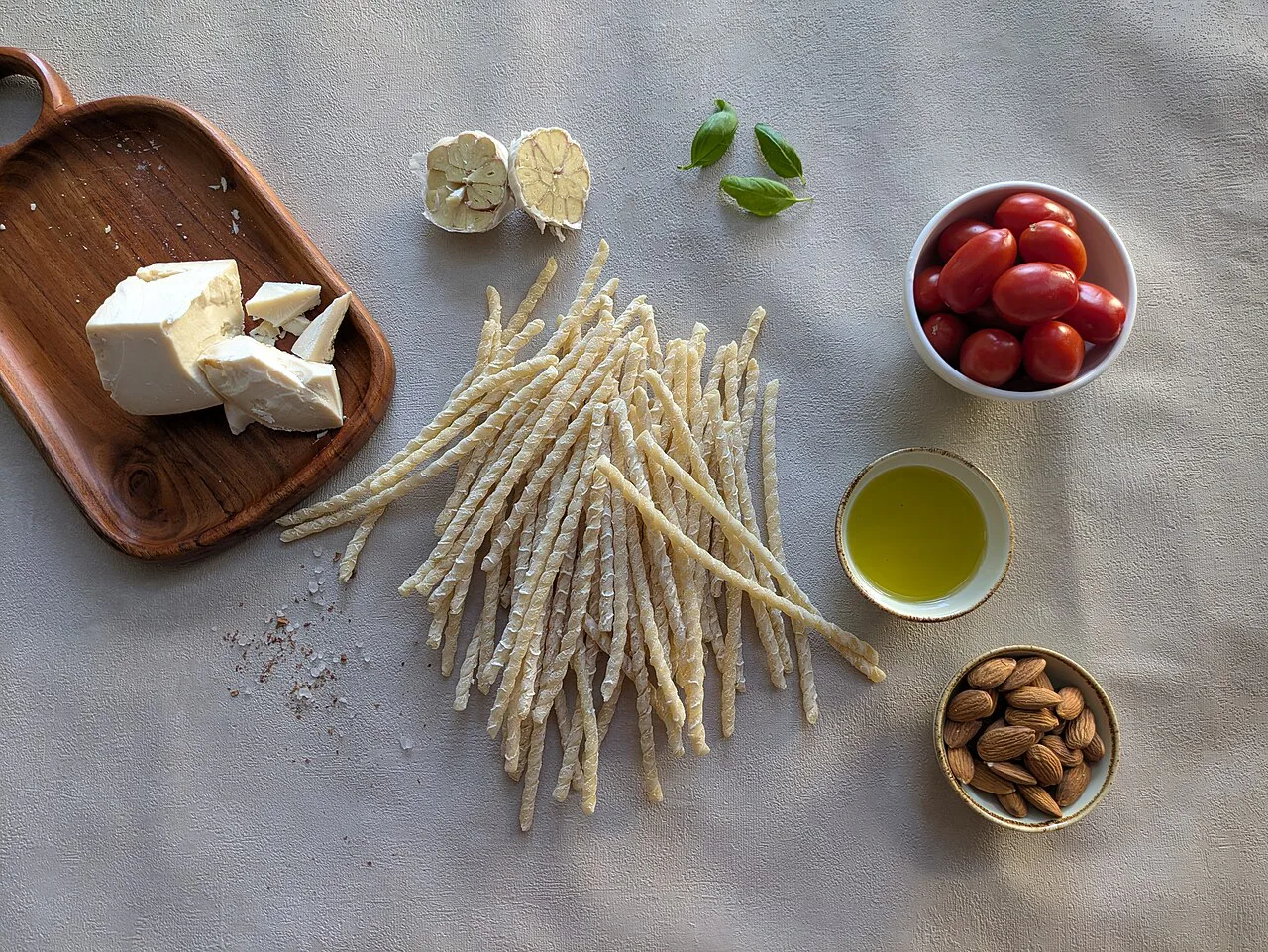 Busiate ingredients with pesto alla trapanese.