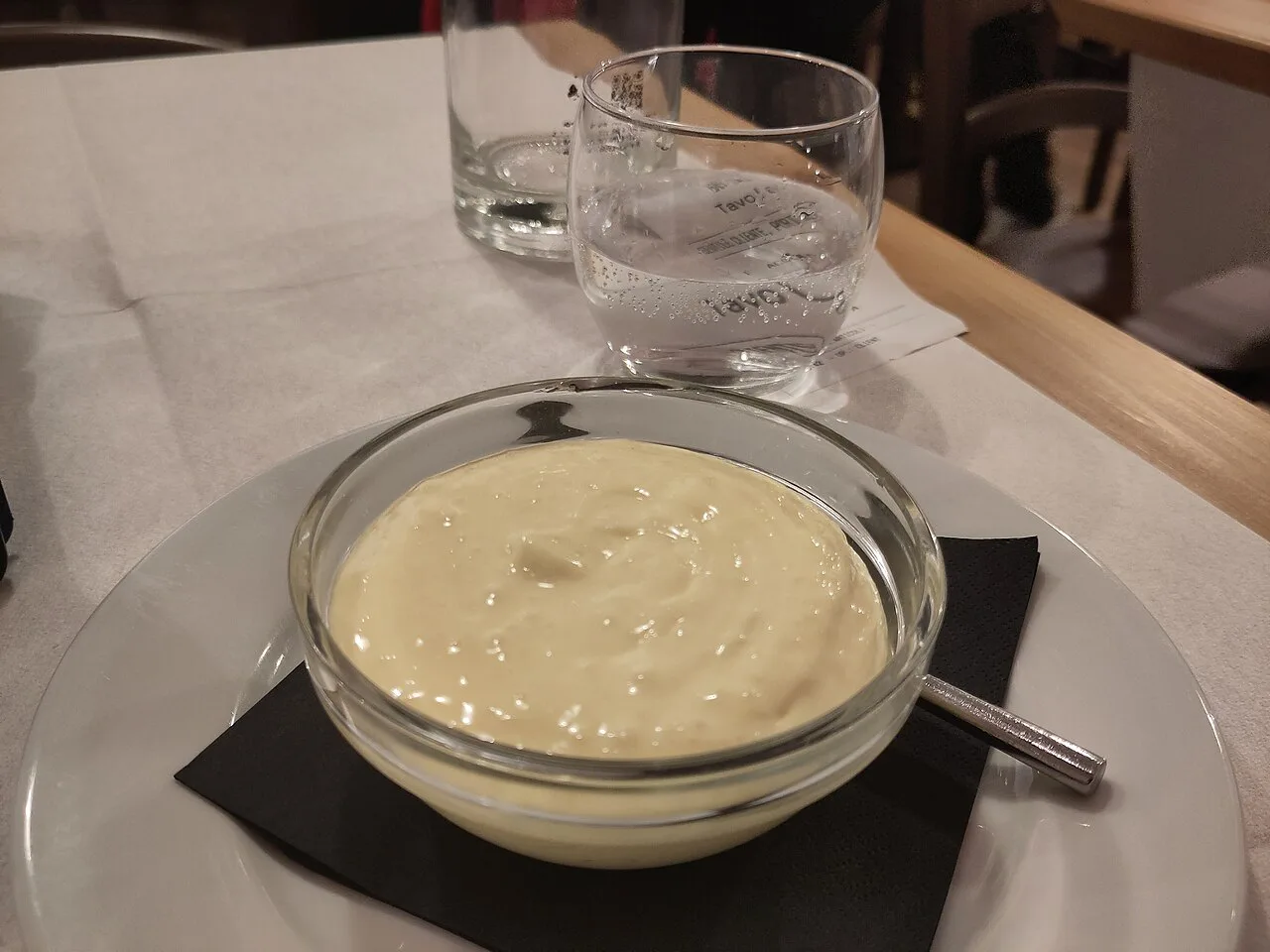 Mascarpone cream dessert at a Bologna trattoria.