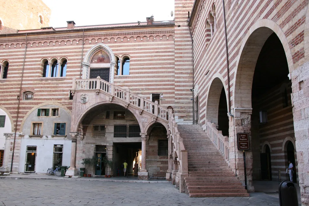 Scala della Ragione in Verona's old market courtyard.